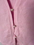 up close button detail on Soft Pink V-Neck Knit Vest Size S — Blue Sparrow