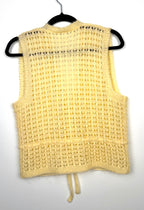 vintage handmade vest back view  on hanger