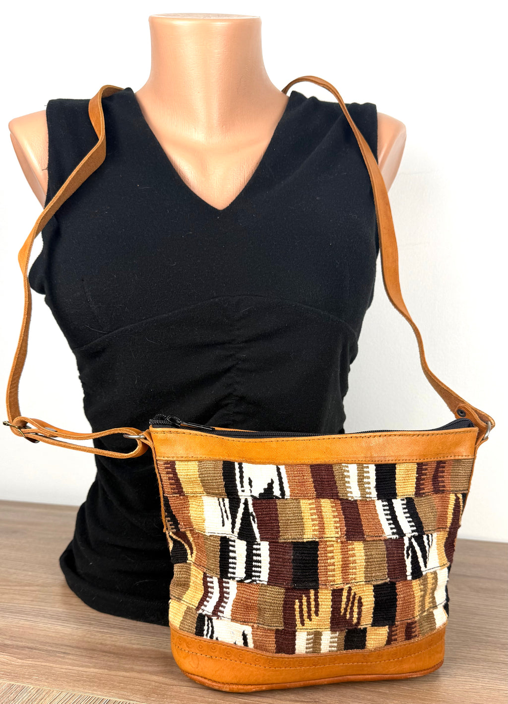 vintage woven boho crossbody bag on mannequin 