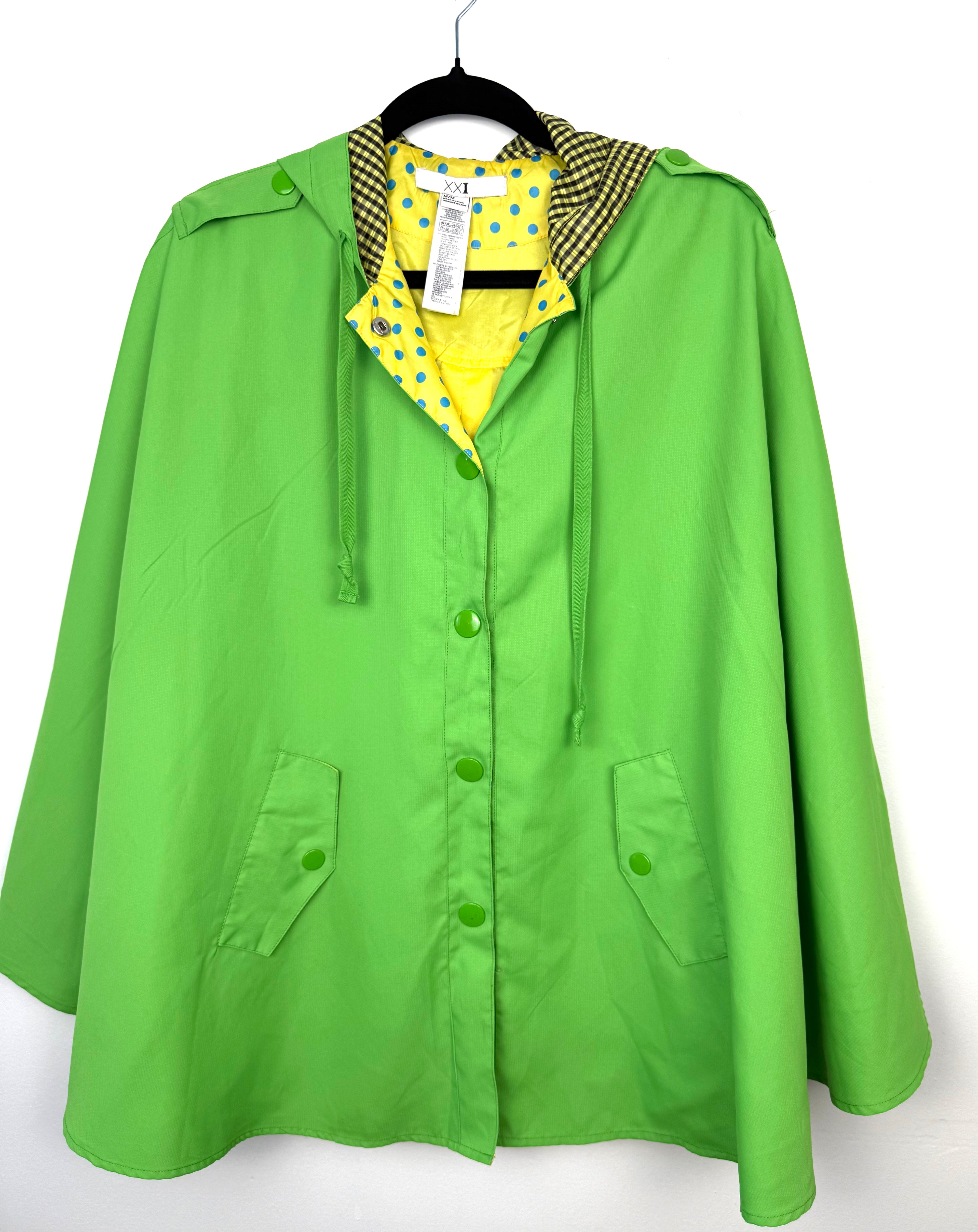 women’s lime green rain jacket with hood and snap button front - poncho style rain jacket on hanger
