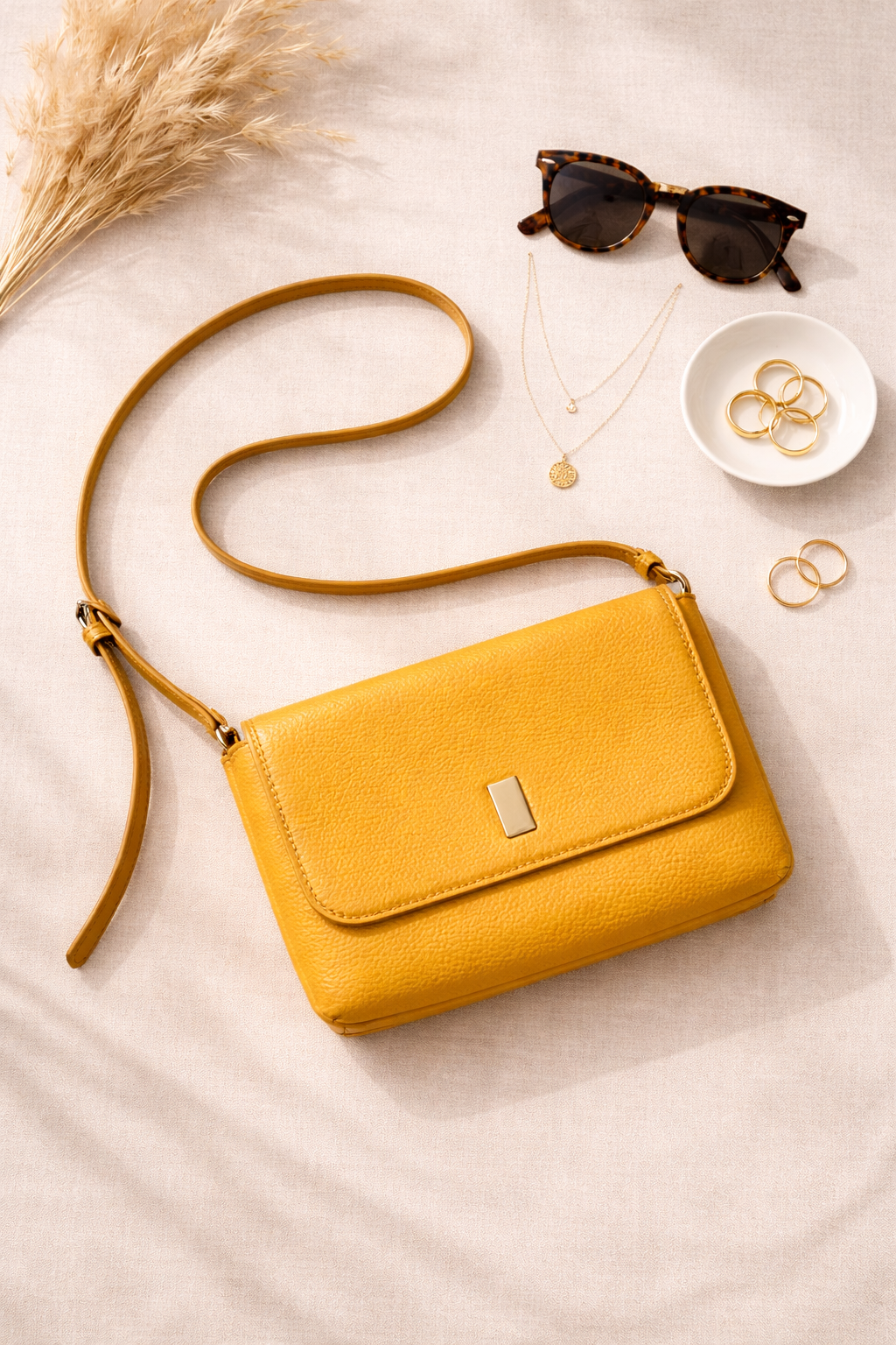 Yellow vegan leather cross body bag at Blue Sparrow Shop Canada Resale lifestyle photo 