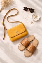 Yellow vegan leather cross body bag at Blue Sparrow Shop Canada Resale lifestyle photo 